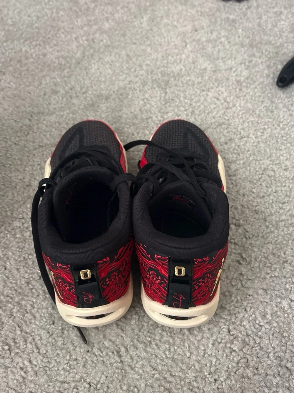 Jordan Men's Black and Red Low-Top Sneakers with Gold Logo